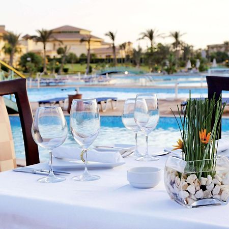 Moevenpick Hotel Cairo - Media City Giza Exterior photo The pool at the resort