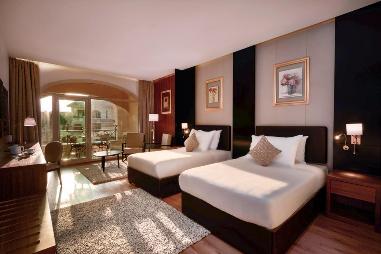 Moevenpick Hotel Cairo - Media City Giza Exterior photo Deluxe Room
