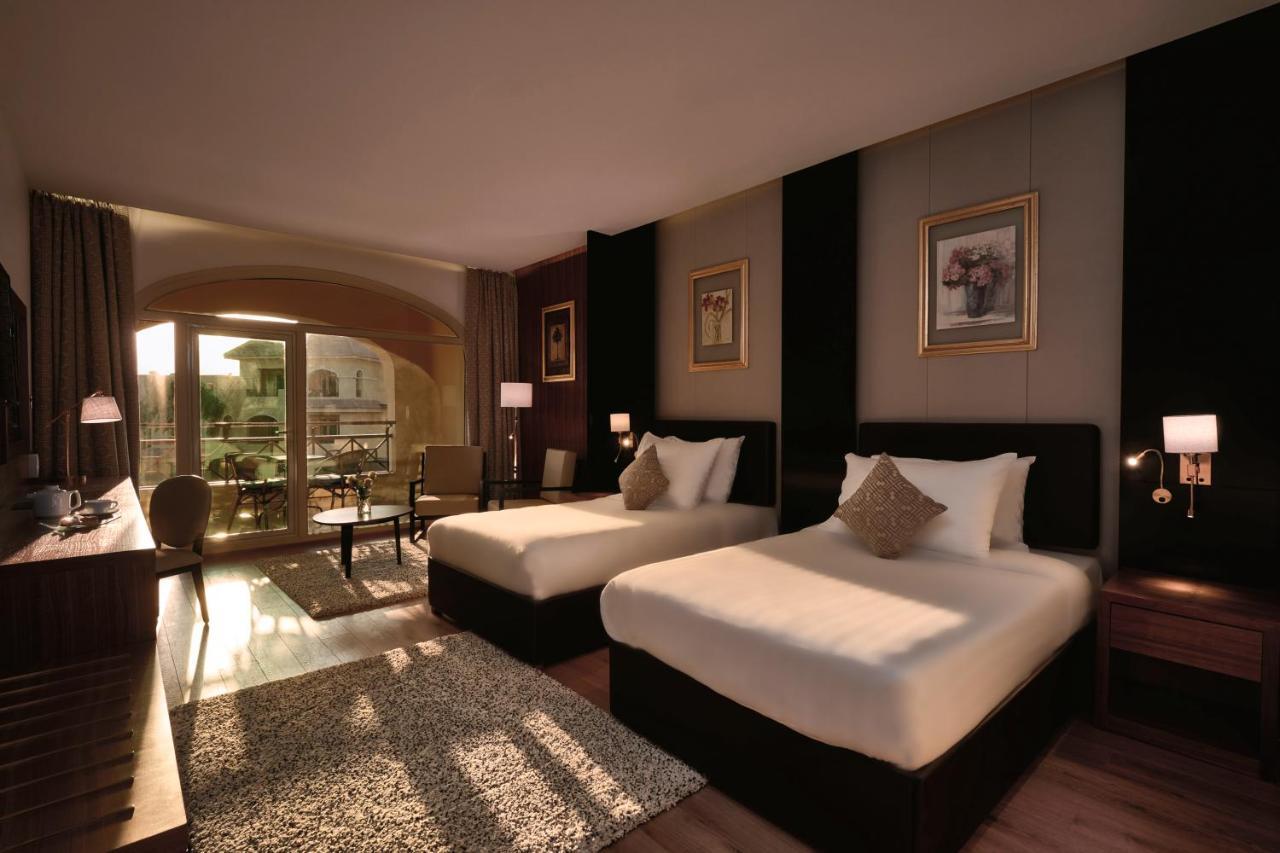 Moevenpick Hotel Cairo - Media City Giza Exterior photo Deluxe Room