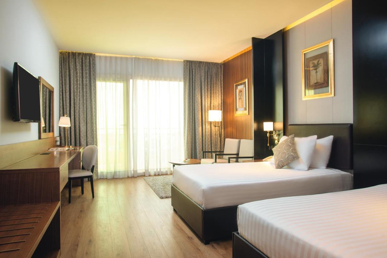Moevenpick Hotel Cairo - Media City Giza Exterior photo Deluxe Room