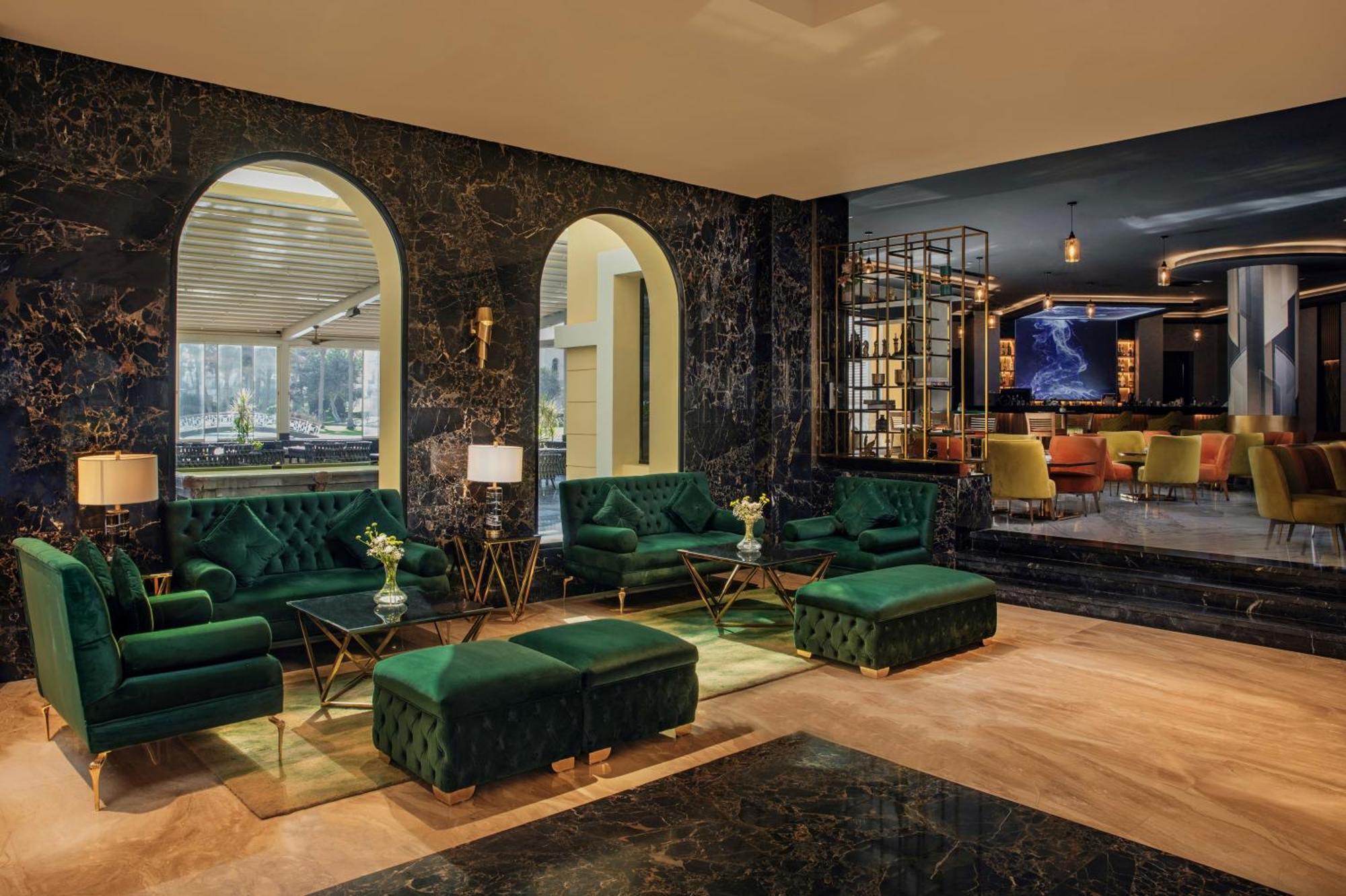Moevenpick Hotel Cairo - Media City Giza Exterior photo The lounge at the airport
