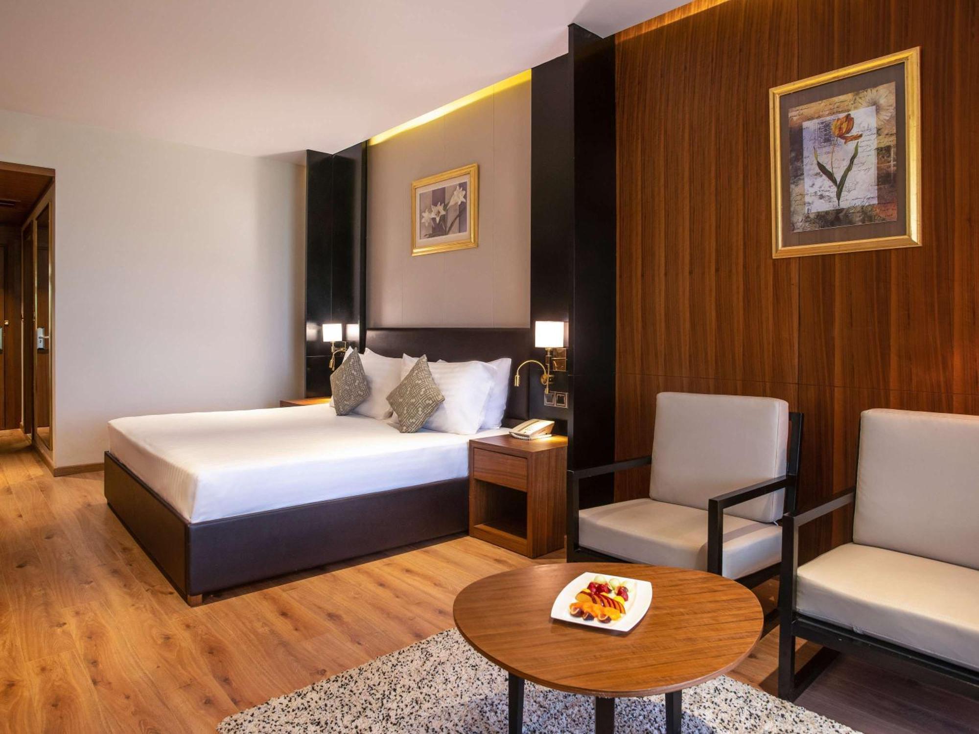 Moevenpick Hotel Cairo - Media City Giza Exterior photo Deluxe Room