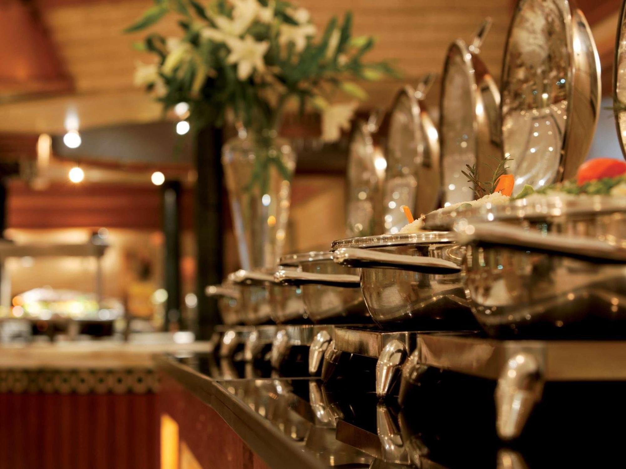 Moevenpick Hotel Cairo - Media City Giza Exterior photo A buffet at a hotel