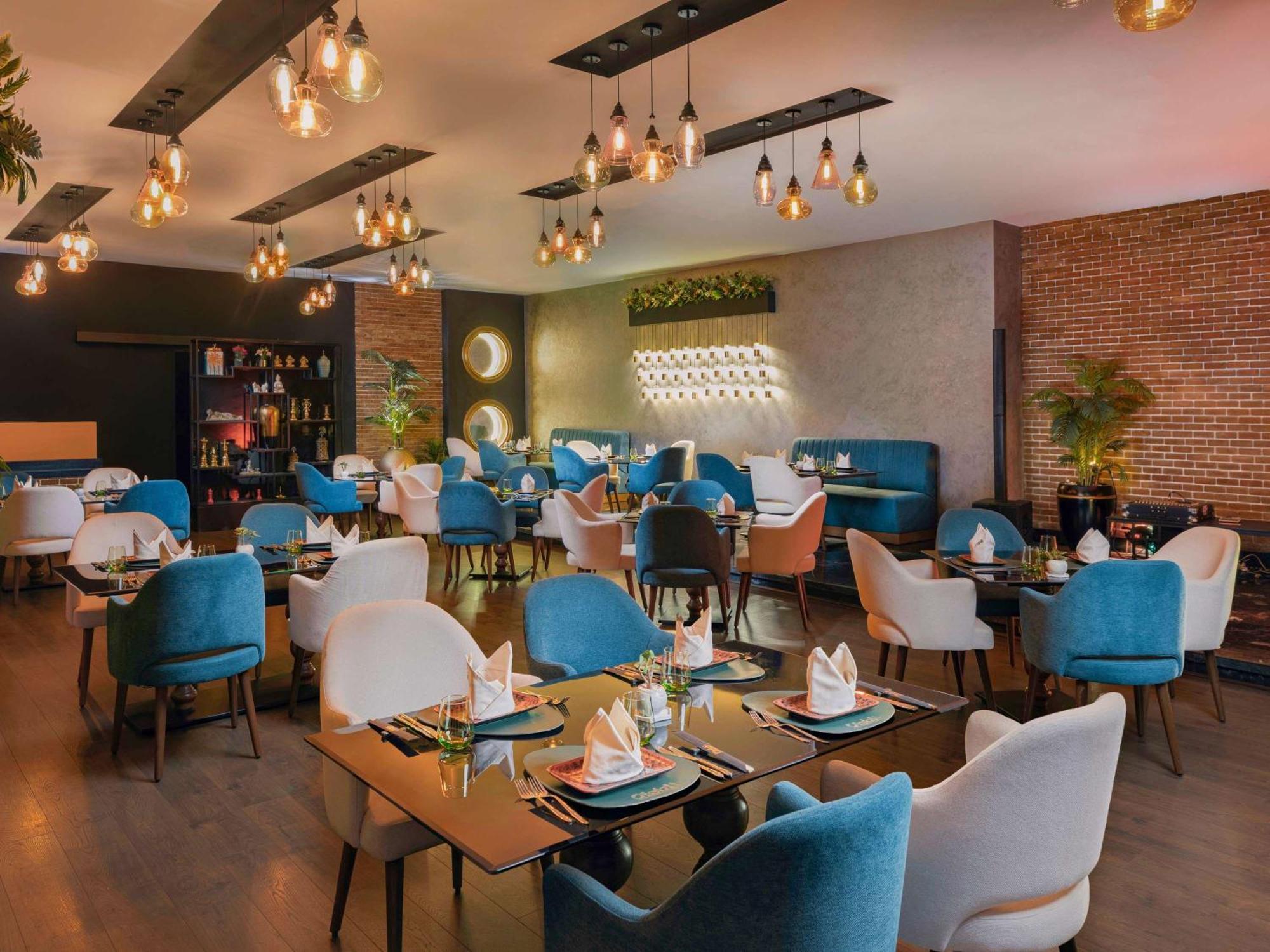 Moevenpick Hotel Cairo - Media City Giza Exterior photo The restaurant