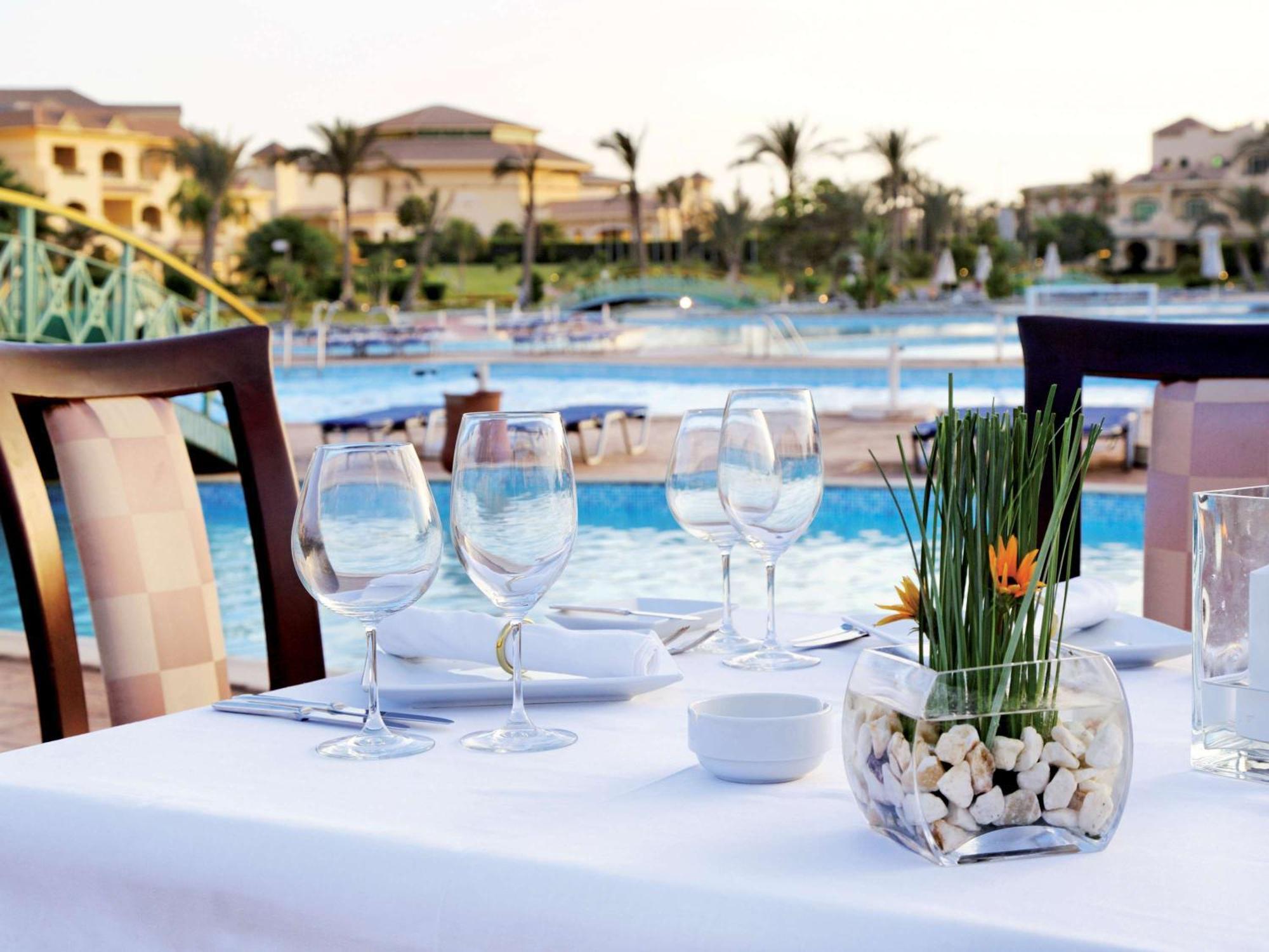 Moevenpick Hotel Cairo - Media City Giza Exterior photo The pool at the resort